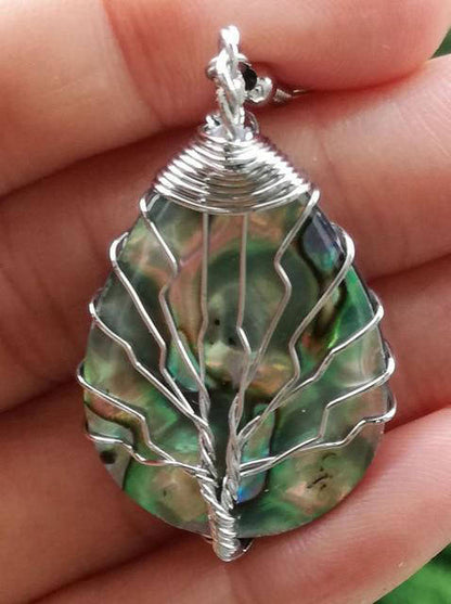 Pendentif Arbre de Vie Coquillage Élégance et Symbolisme Divin
