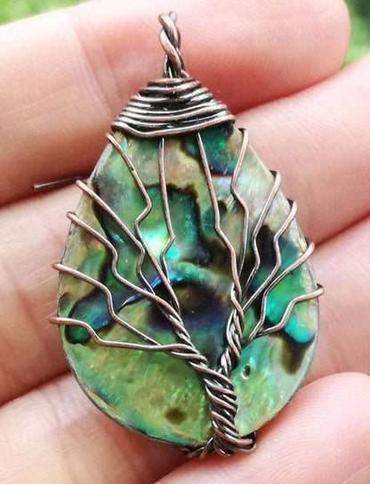 Pendentif Arbre de Vie Coquillage Élégance et Symbolisme Divin