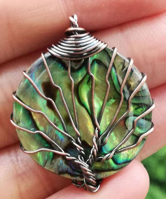 Pendentif Arbre de Vie Coquillage Élégance et Symbolisme Divin