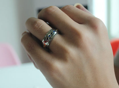 Bague Anti-Stress Arc-en-Ciel : Équilibre et Sérénité à Votre Portée